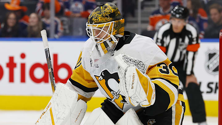 Oct 25, 2024; Edmonton, Alberta, CAN; Pittsburgh Penguins goaltender Joel Blomqvist (30) follows the play against the Edmonton Oilers at Rogers Place. Mandatory Credit: Perry Nelson-Imagn Images