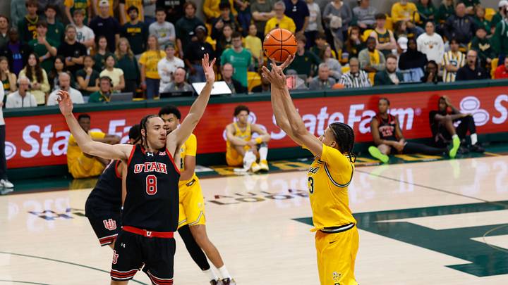 Mar 7, 2026; Waco, Texas, USA; Baylor Bears guard Cameron Carr (43) scores a three-point basket against Utah Utes forward Keanu Dawes (8) during the second half at Paul and Alejandra Foster Pavilion. Mandatory Credit: Chris Jones-Imagn Images Mar 7, 2026; Waco, Texas, USA; Baylor Bears guard Cameron Carr (43) scores a three-point basket against Utah Utes forward Keanu Dawes (8) during the second half at Paul and Alejandra Foster Pavilion. Mandatory Credit: Chris Jones-Imagn Images