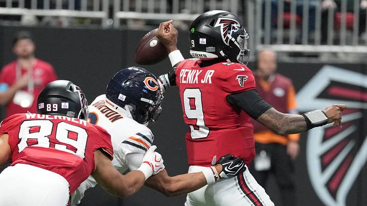 Kyler Gordon strips the ball from Atlanta quarterback Michael Penix Jr. during the third quarter of Sunday's 31-23 Bears win. Kyler Gordon strips the ball from Atlanta quarterback Michael Penix Jr. during the third quarter of Sunday's 31-23 Bears win.