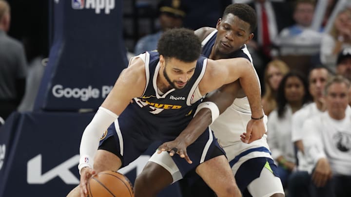 May 12, 2024; Minneapolis, Minnesota, USA; Denver Nuggets guard Jamal Murray (27) works in front of May 12, 2024; Minneapolis, Minnesota, USA; Denver Nuggets guard Jamal Murray (27) works in front of
