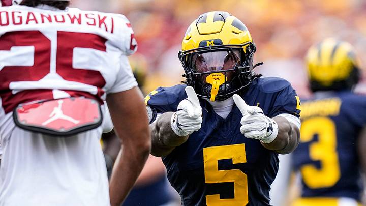 Michigan running back Savion Hiter (5) celebrates a first down against Oklahoma during the first half at Michigan Stadium in Ann Arbor on Saturday, Sept. 12, 2026. Michigan running back Savion Hiter (5) celebrates a first down against Oklahoma during the first half at Michigan Stadium in Ann Arbor on Saturday, Sept. 12, 2026.