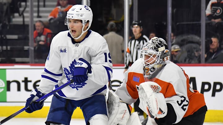 Mar 14, 2024; Philadelphia, Pennsylvania, USA; Toronto Maple Leafs center Calle Jarnkrok (19) screens Philadelphia Flyers goaltender Felix Sandstrom (32) during the second period at Wells Fargo Center. Mandatory Credit: Eric Hartline-Imagn Images