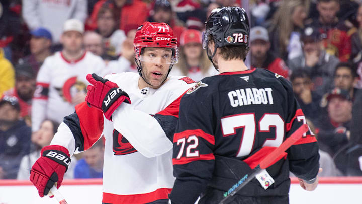 Apr 25, 2026; Ottawa, Ontario, CAN; Carolina Hurricanes left wing Taylor Hall (71) speaks with Ottawa Senators defenseman Thomas Chabot (72) in the second period of game four of the first round of the 2026 Stanley Cup Playoffs at the Canadian Tire Centre. Mandatory Credit: Marc DesRosiers-Imagn