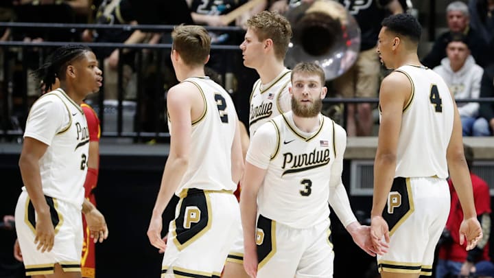 Purdue Boilermakers guard Braden Smith (3) high-fives Purdue Boilermakers forward Trey Kaufman-Renn (4)