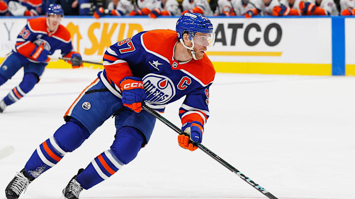 Nov 12, 2024; Edmonton, Alberta, CAN; Edmonton Oilers forward Connor McDavid (97) carries the puck up the ice against the New York Islanders at Rogers Place. Mandatory Credit: Perry Nelson-Imagn Images
