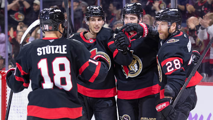 Nov 13, 2025; Ottawa, Ontario, CAN; Ottawa Senators right wing Claude Giroux (28) celebrates with center Tim Stutzle (18), Dylan Cozens (24) and right wing Drake Batherson (19) after scoring in the first period against the Boston Bruins at the Canadian Tire Centre. Mandatory Credit: Marc DesRosiers-IMAGN Images