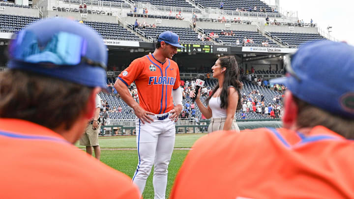ESPN sideline reporter Dani Wexelman interviews Florida Gators starting pitcher Jac Caglianone (14) after the win against the NC State Wolfpack at Charles Schwab Field Omaha on June 17, 2024. ESPN sideline reporter Dani Wexelman interviews Florida Gators starting pitcher Jac Caglianone (14) after the win against the NC State Wolfpack at Charles Schwab Field Omaha on June 17, 2024.