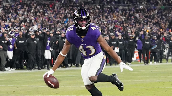 Jan 11, 2025; Baltimore, Maryland, USA; Baltimore Ravens running back Justice Hill (43) scores a touchdown against the Pittsburgh Steelers in the second quarter in an AFC wild card game at M&T Bank Stadium. Mandatory Credit: Mitch Stringer-Imagn Images Jan 11, 2025; Baltimore, Maryland, USA; Baltimore Ravens running back Justice Hill (43) scores a touchdown against the Pittsburgh Steelers in the second quarter in an AFC wild card game at M&T Bank Stadium. Mandatory Credit: Mitch Stringer-Imagn Images