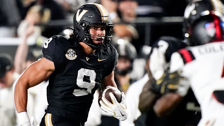 Vanderbilt tight end Eli Stowers (9) runs in a touchdown against Ball State during the second quarter at FirstBank Stadium in Nashville, Tenn., Saturday, Oct. 19, 2024.