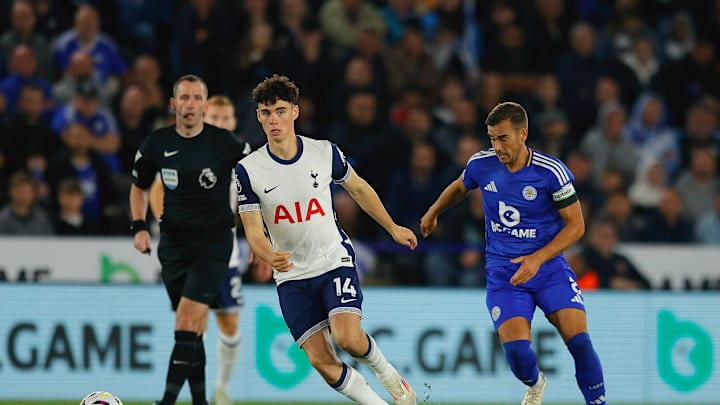 Archie Gray in action against Leicester City on the opening weekend, with former Spurs player Harry Winks in close attendance 