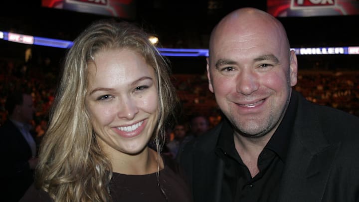 May 5, 2012; East Rutherford, NJ, USA; UFC president Dana White (right) poses with Strikeforce MMA female champion Ronda Rousey during a bout between Johny Hendricks and Josh Koscheck during UFC on Fox 3 at the Izod Center. Mandatory Credit: Joe Camporeale-Imagn Images