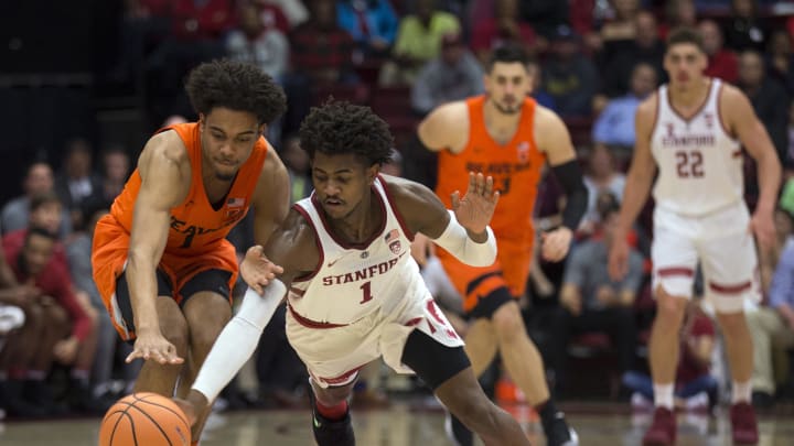 Feb 1, 2018; Stanford, CA, USA; Oregon State Beavers guard Stephen Thompson Jr., left, and Stanford Cardinal guard Daejon Davis pursue a loose ball during the first half of an NCAA men's college basketball game at Maples Pavilion. Mandatory Credit: D. Ross Cameron-USA TODAY Sports Feb 1, 2018; Stanford, CA, USA; Oregon State Beavers guard Stephen Thompson Jr., left, and Stanford Cardinal guard Daejon Davis pursue a loose ball during the first half of an NCAA men's college basketball game at Maples Pavilion. Mandatory Credit: D. Ross Cameron-USA TODAY Sports