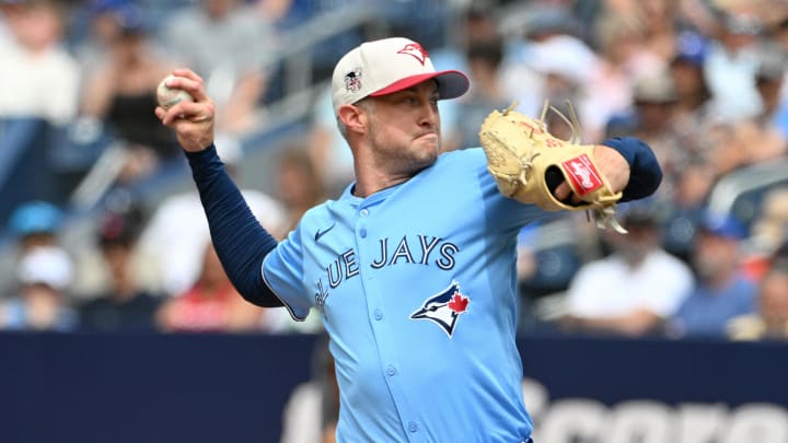 Jul 4, 2024; Toronto, Ontario, CAN; Toronto Blue Jays relief pitcher Trevor Richards (33) delivers a pitch against the Houston Astros in the seventh inning at Rogers Centre. Mandatory Credit: Dan Hamilton-USA TODAY Sports Jul 4, 2024; Toronto, Ontario, CAN; Toronto Blue Jays relief pitcher Trevor Richards (33) delivers a pitch against the Houston Astros in the seventh inning at Rogers Centre. Mandatory Credit: Dan Hamilton-USA TODAY Sports