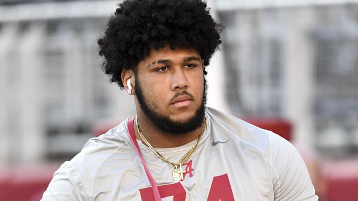 Nov 4, 2023; Tuscaloosa, Alabama, USA;  Alabama Crimson Tide offensive lineman Kadyn Proctor (74) comes out to loosen up before a game against the LSU Tigers at Bryant-Denny Stadium. Mandatory Credit: Gary Cosby Jr.-Imagn Images