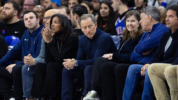 Jan 14, 2025; Philadelphia, Pennsylvania, USA; Philadelphia 76ers owner Josh Harris (middle) look on during the fourth quarter against the Oklahoma City Thunder at Wells Fargo Center. Mandatory Credit: Bill Streicher-Imagn Images