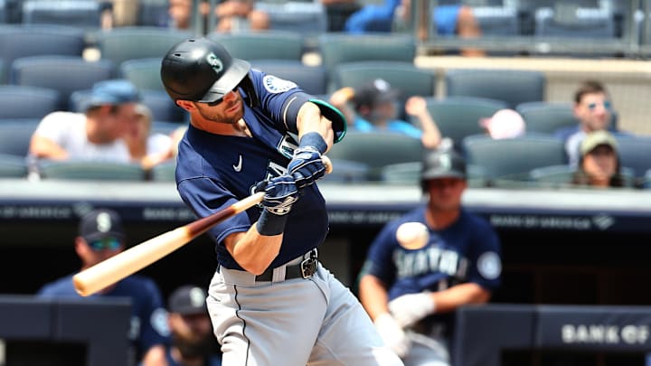 Seattle Mariners right fielder Mitch Haniger (17) hits an RBI sacrifice fly against the New York Yankees during the second inning at Yankee Stadium in 2021.