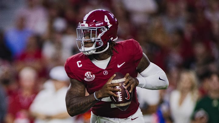 Sep 7, 2024; Tuscaloosa, Alabama, USA; Alabama Crimson Tide quarterback Jalen Milroe (4) looks for a pass against the South Florida Bulls during the second quarter at Bryant-Denny Stadium. Mandatory Credit: William McLelland-Imagn Images