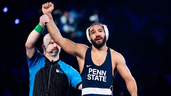 Shayne Van Ness of the Penn State Nittany Lions wins his bout against Nebraska's Chance Lamer during a Big Ten dual meet. 