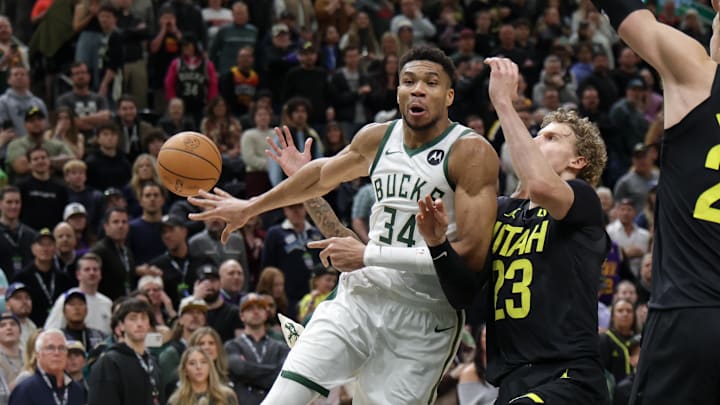Feb 4, 2024; Salt Lake City, Utah, USA;  Milwaukee Bucks forward Giannis Antetokounmpo (34) passes the ball without looking during the second half against the Utah Jazz at Delta Center. Mandatory Credit: Chris Nicoll-Imagn Images