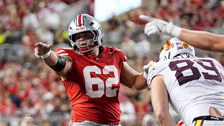 Ohio State Buckeyes offensive lineman Joshua Padilla (62) motions during the NCAA football game against the Minnesota Golden Gophers at Ohio Stadium in Columbus on Oct. 4, 2025.