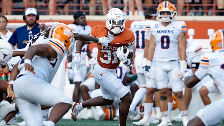 Sep 13, 2025; Austin, Texas, USA; Texas Longhorns running back James Simon (31) runs for yards during the second half against the Texas El Paso Miners at Darrell K Royal-Texas Memorial Stadium. Mandatory Credit: Scott Wachter-Imagn Images