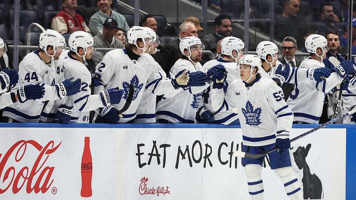 Apr 9, 2026; Elmont, New York, USA;  Toronto Maple Leafs right wing Easton Cowan (53) celebrates with teammates after scoring a goal in the second period against the New York Islanders at UBS Arena. Mandatory Credit: Wendell Cruz-Imagn Images