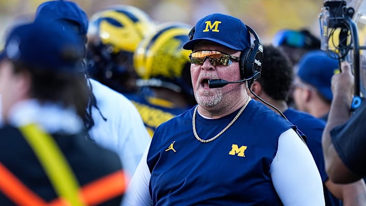 Michigan defensive coordinator Wink Martindale talks to players after a play against USC during the second half at Michigan Stadium in Ann Arbor on Saturday, Sept. 21, 2024.