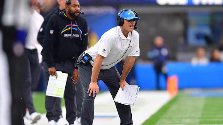 Oct 27, 2024; Inglewood, California, USA; Los Angeles Chargers head coach Jim Harbaugh watches game action against the New Orleans Saints during the second half at SoFi Stadium. Mandatory Credit: Gary A. Vasquez-Imagn Images