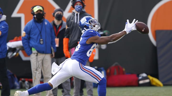 Nov 29, 2020; Cincinnati, Ohio, USA;  New York Giants wide receiver Darius Slayton (86) drops a pass against the Cincinnati Bengals during the first quarter at Paul Brown Stadium.  