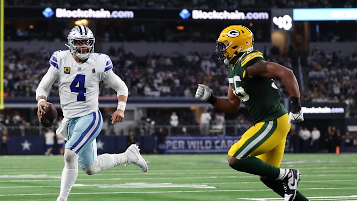 Jan 14, 2024; Arlington, Texas, USA; Dallas Cowboys quarterback Dak Prescott (4) rushes for a