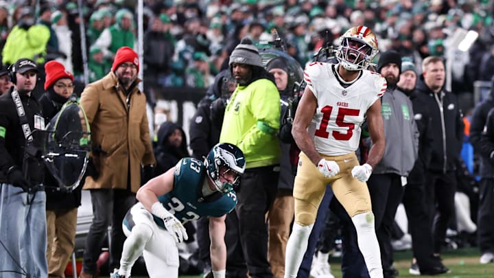 Jan 11, 2026; Philadelphia, PA, USA; San Francisco 49ers wide receiver Jauan Jennings (15) reacts in front of Philadelphia Eagles cornerback Cooper DeJean (33) after a first down catch in an NFC Wild Card Round game at Lincoln Financial Field. Mandatory Credit: Bill Streicher-Imagn Images