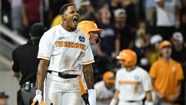 Jun 14, 2024; Omaha, NE, USA; Tennessee Volunteers second baseman Christian Moore (1) celebrates scoring the tying run against the Florida State Seminoles during the ninth inning at Charles Schwab Filed Omaha. Mandatory Credit: Steven Branscombe-USA TODAY Sports Jun 14, 2024; Omaha, NE, USA; Tennessee Volunteers second baseman Christian Moore (1) celebrates scoring the tying run against the Florida State Seminoles during the ninth inning at Charles Schwab Filed Omaha. Mandatory Credit: Steven Branscombe-USA TODAY Sports
