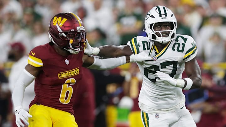Green Bay Packers Green Bay Packers safety Kitan Oladapo (27) against Washington Commanders cornerback Noah Igbinoghene (6) during a game on Sept. 11, 2025, at Lambeau Field in Green Bay, Wis. The Packers defeated the Commanders 27-18.