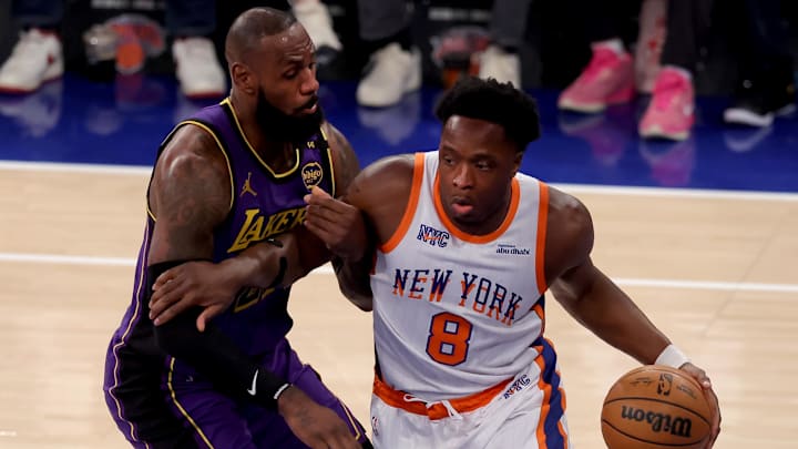 Feb 1, 2025; New York, New York, USA; New York Knicks forward OG Anunoby (8) controls the ball against Los Angeles Lakers forward LeBron James (23) during the first quarter at Madison Square Garden. Mandatory Credit: Brad Penner-Imagn Images