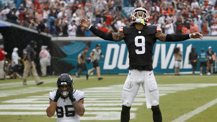 Sep 15, 2024; Jacksonville, Florida, USA; Cleveland Browns safety Grant Delpit (9) celebrates a win next to Jacksonville Jaguars tight end Brenton Strange (85) at EverBank Stadium. Mandatory Credit: Morgan Tencza-Imagn Images