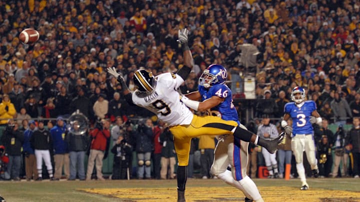 Nov 24, 2007; Kansas City, MO, USA; Missouri Tigers wide receiver Jeremy Macin (9) misses the pass in the endzone in the first quarter in the game against the Kansas Jayhawks at Arrowhead Stadium in Kansas City, MO. Mandatory Credit: Denny Medley-Imagn Images Nov 24, 2007; Kansas City, MO, USA; Missouri Tigers wide receiver Jeremy Macin (9) misses the pass in the endzone in the first quarter in the game against the Kansas Jayhawks at Arrowhead Stadium in Kansas City, MO. Mandatory Credit: Denny Medley-Imagn Images
