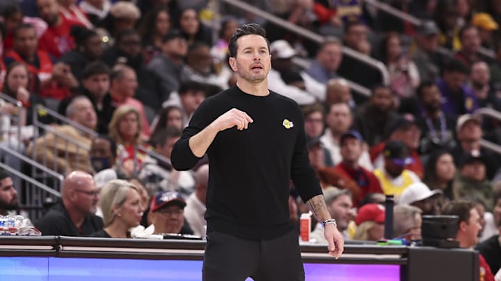 Mar 16, 2026; Houston, Texas, USA; Los Angeles Lakers head coach JJ Redick reacts during a play in the third quarter. Mandatory Credit: Troy Taormina-Imagn Images Mar 16, 2026; Houston, Texas, USA; Los Angeles Lakers head coach JJ Redick reacts during a play in the third quarter. Mandatory Credit: Troy Taormina-Imagn Images