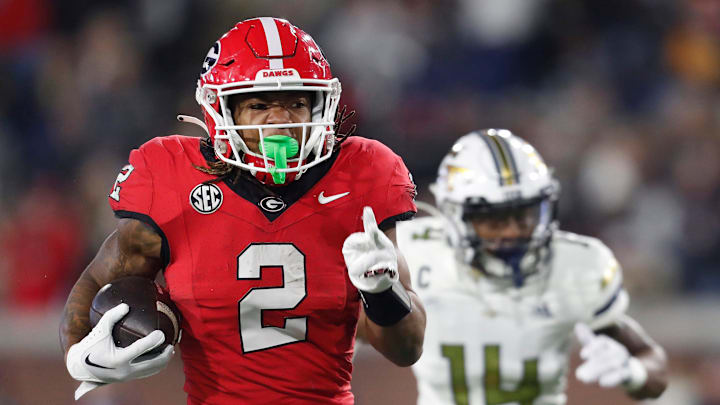 Georgia running back Kendall Milton (2) moves the ball down the field during the first half of a NCAA college football game against Georgia Tech in Atlanta, on Saturday, Nov. 25, 2023.
