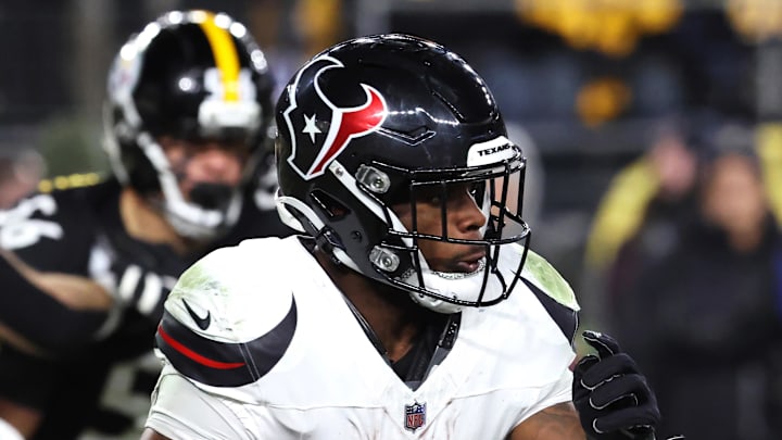 Jan 12, 2026; Pittsburgh, PA, USA; Houston Texans running back Woody Marks (27) runs during the first half of an AFC Wild Card Round game against the Pittsburgh Steelers at Acrisure Stadium. Mandatory Credit: Charles LeClaire-Imagn Images Jan 12, 2026; Pittsburgh, PA, USA; Houston Texans running back Woody Marks (27) runs during the first half of an AFC Wild Card Round game against the Pittsburgh Steelers at Acrisure Stadium. Mandatory Credit: Charles LeClaire-Imagn Images