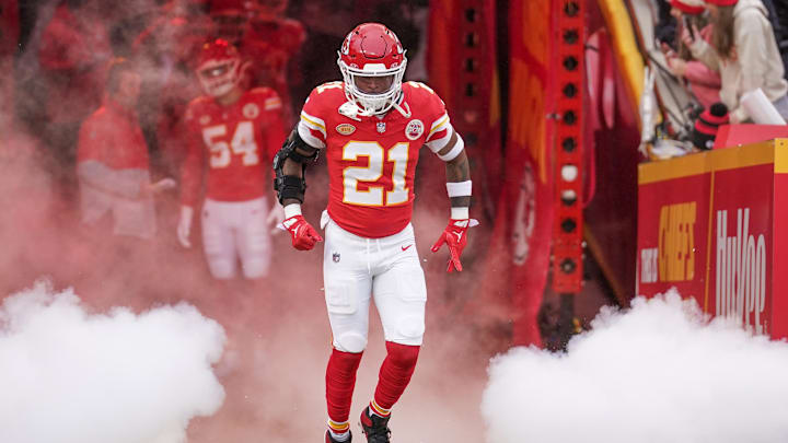 Dec 25, 2023; Kansas City, Missouri, USA; Kansas City Chiefs safety Mike Edwards (21) is introduced against the Las Vegas Raiders prior to a game at GEHA Field at Arrowhead Stadium. Mandatory Credit: Denny Medley-Imagn Images