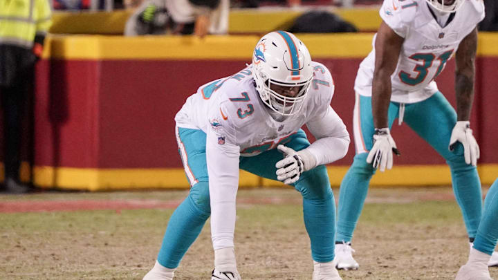 Miami Dolphins tackle Austin Jackson (73) at the line of scrimmage against the Kansas City Chiefs in a 2024 AFC wild card game at GEHA Field at Arrowhead Stadium.