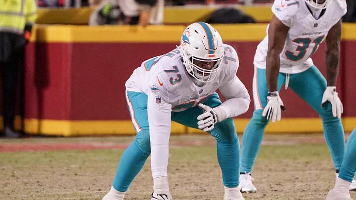 Jan 13, 2024; Kansas City, Missouri, USA; Miami Dolphins guard Austin Jackson (73) at the line of scrimmage against the Kansas City Chiefs in a 2024 AFC wild card game at GEHA Field at Arrowhead Stadium. Mandatory Credit: Denny Medley-Imagn Images