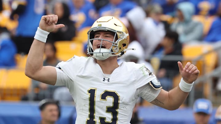 Nov 15, 2025; Pittsburgh, Pennsylvania, USA;  Notre Dame Fighting Irish quarterback CJ Carr (13) calls an audible at the line of scrimmage against the Pittsburgh Panthers during the fourth quarter at Acrisure Stadium. Mandatory Credit: Charles LeClaire-Imagn Images