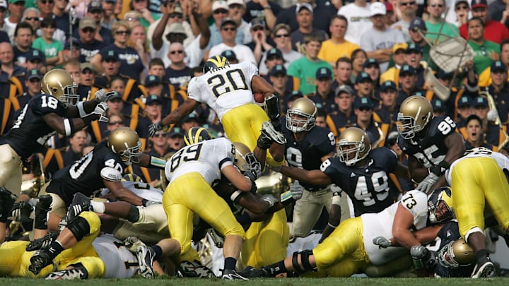 Michael Hart hurdle the Notre Dame defense for a touchdown.