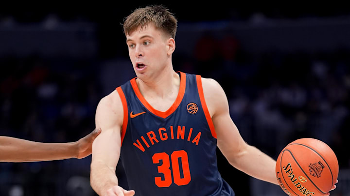 Mar 14, 2026; Charlotte, NC, USA; Virginia Cavaliers guard Dallin Hall (30) dribbles the ball against the Duke Blue Devils during the men's ACC Conference Tournament Championship at Spectrum Center. Mandatory Credit: Jim Dedmon-Imagn Images Mar 14, 2026; Charlotte, NC, USA; Virginia Cavaliers guard Dallin Hall (30) dribbles the ball against the Duke Blue Devils during the men's ACC Conference Tournament Championship at Spectrum Center. Mandatory Credit: Jim Dedmon-Imagn Images