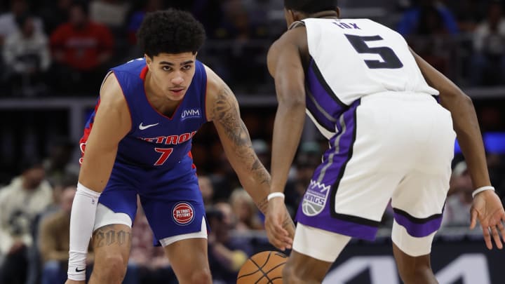 Jan 9, 2024; Detroit, Michigan, USA; Detroit Pistons guard Killian Hayes (7) dribbles defended by Sacramento Kings guard De'Aaron Fox (5) in the second half at Little Caesars Arena. Mandatory Credit: Rick Osentoski-USA TODAY Sports Jan 9, 2024; Detroit, Michigan, USA; Detroit Pistons guard Killian Hayes (7) dribbles defended by Sacramento Kings guard De'Aaron Fox (5) in the second half at Little Caesars Arena. Mandatory Credit: Rick Osentoski-USA TODAY Sports