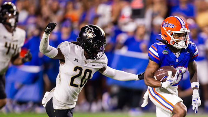 Florida Gators wide receiver Tank Hawkins (10) outruns UCF Knights defensive back Mac McWilliams (20) during the first half at Ben Hill Griffin Stadium in Gainesville, FL on Saturday, October 5, 2024. [Doug Engle/Gainesville Sun]