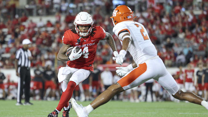 Sep 23, 2023; Houston, Texas, USA; Houston Cougars wide receiver Samuel Brown (4) runs with the ball