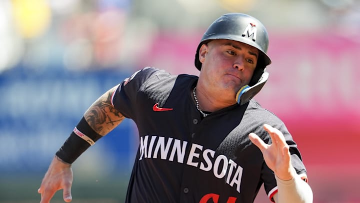 Minnesota Twins first baseman Jose Miranda (64) runs to third base during the first inning against the Kansas City Royals at Kauffman Stadium in Kansas City, Mo., on Sept. 8, 2024.