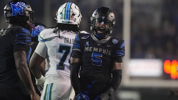 Memphis' Chris Bracy (5) celebrates after the defense made a stop during the game between Memphis and Tulane at Simmons Bank Liberty Stadium in Memphis, Tenn., on November 7, 2025.